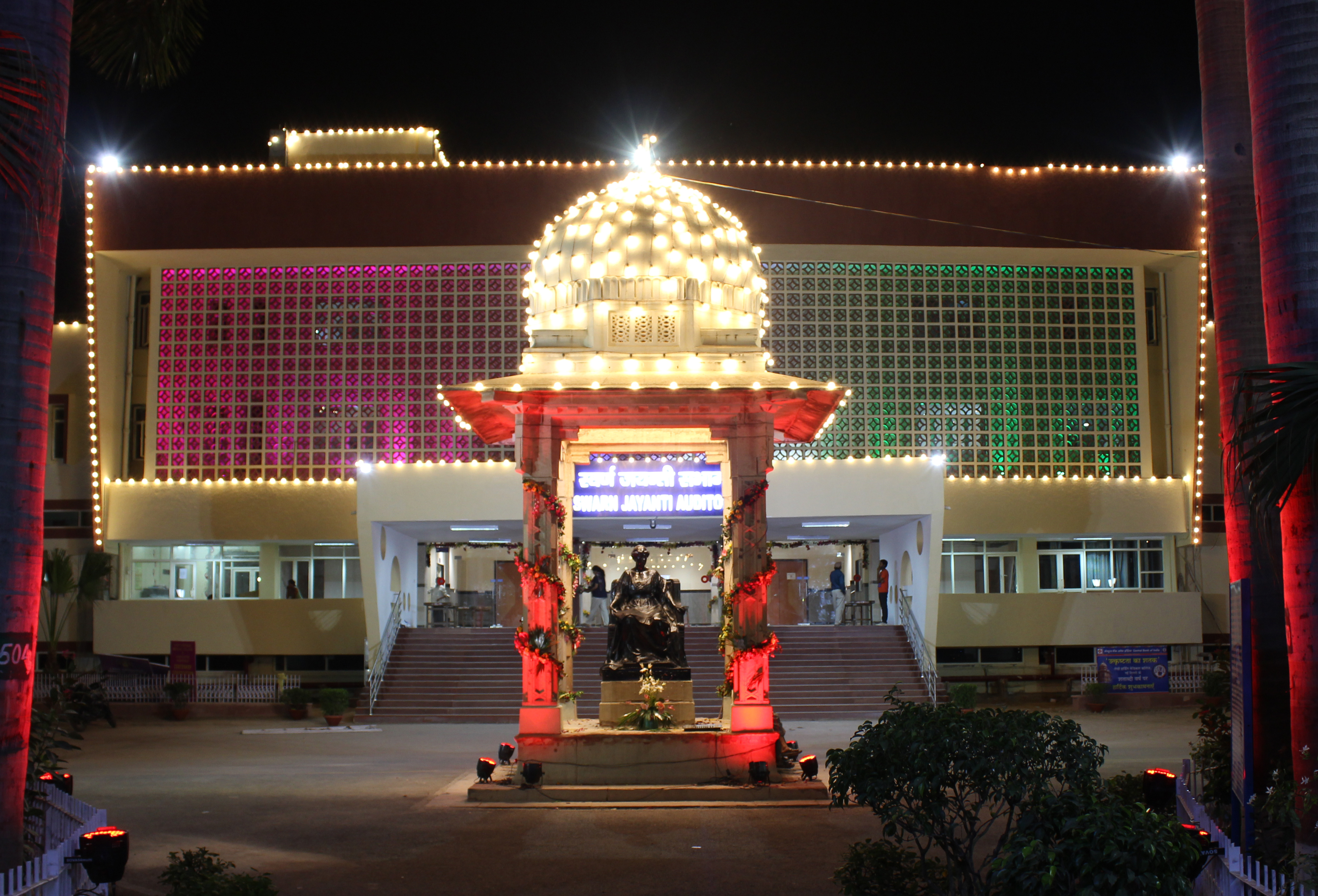 Illuminated LHMC campus building and entrance